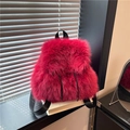 Fuchsia plush faux fur backpack with black nylon straps for autumn and winter casual style - Red