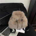 Faux fur plush backpack in light khaki with black drawstring and nylon straps - Brown