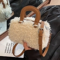 Faux shearling crossbody bag in beige with brown leather handles and silver hardware - Cream-Brown