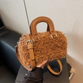 Brown faux shearling cylinder bucket bag with leather handles and silver hardware - Brown