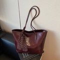 Large dark burgundy leather tote bag featuring elegant polka dot scarf handle accessory - Burgundy
