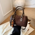 Retro dark brown suede boston bag with wooden bead charm and smooth leather handles - Brown