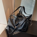 Minimalist black large capacity Boston tote bag with adjustable shoulder strap and matte finish - Black