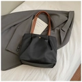 Chic black nylon tote bag with brown leather handles and gold rivet detail - Small / Black