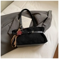 Detail of black suede tote bag with leather belt buckle and leopard heart charm - Black with Pendant