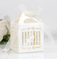 Laser-cut white wedding favor box with birdcage design and elegant white ribbon bow - Starry White