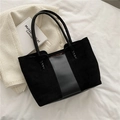Sac fourre-tout noir minimaliste avec texture daim mat et finition en cuir lisse - Noir