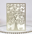 Dettaglio dell'albero della vita tagliato al laser su carta glitterata dorata con uccelli - Oro Chiaro Glitter
