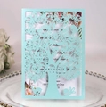 Détail de carte d'invitation bleu clair avec arbre découpé au laser et décor élégant - Bleu Tiffany