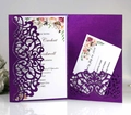 Detail of purple laser-cut wedding invitation set with intricate floral mandala patterns - Dark Purple