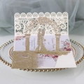 Detail of 3D pop-up wedding invitation with laser-cut gold glitter and floral design - Light Gold Glitter