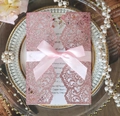 Elegant rose gold glitter laser-cut wedding invitation with pink ribbon and floral insert - Glitter Pink