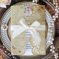 Golden laser cut glitter wedding invitation with floral insert and satin ribbon bow - Glitter Golden Yellow