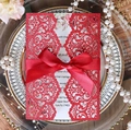 Laser cut red glitter wedding invitation card with elegant white insert and silk bow - Glitter Red