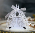 Laser-cut white wedding favor box featuring peacock patterns and white ribbon detail - White