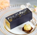 Detail of laser-cut floral pattern on navy blue wedding candy box with gold lining - Black