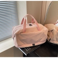 Pink waterproof nylon travel bag with a separate shoe compartment and large capacity - Pink