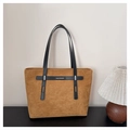 Detailed close-up of brown suede tote bag featuring black leather handles and KALANDAI logo - Khaki