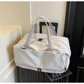 Detail of large capacity travel bag with trolley sleeve on luggage for commuting - Off-white