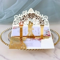 Elegant gold laser-cut wedding invitation featuring silhouette of couple and floral pattern - Reflective Gold