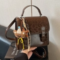 Brown leopard print backpack with retro faux leather finish and plush bear charm - Coffee with Pendant