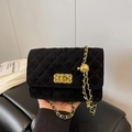 Quilted black velvet crossbody bag with golden chain strap and decorative metal ball charm - Black