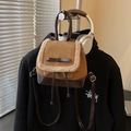 Vintage brown color-block backpack with fuzzy trim and decorative bow accents - Brown No Pendant