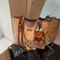 Brown frosted tote bag with plush bear charm and deep brown leather trim accents - With Charm / Khaki