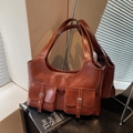Vintage brown faux leather tote bag with double front pockets and metallic buckles - Brown