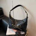 Retro black faux leather underarm dumpling bag with antique gold buckle and cross straps - Black