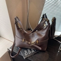 Vintage dark brown faux leather crescent bag with golden buckle and crossbody strap - Brown