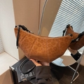Brown leopard print crescent bag with black twisted rope shoulder strap and silver zipper - Brown