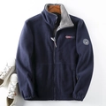 Detail of navy blue fleece jacket with warm grey faux shearling lining and embroidery - XS / Navy Blue