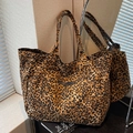 Large leopard print canvas tote bag with dual handles and front pocket for daily commute - Brown