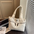 Off-white canvas tote bag featuring a double zipper pocket design for women's daily commute - Off White