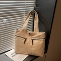 Beige canvas tote bag featuring dual front zipper pockets and leather pullers - Khaki