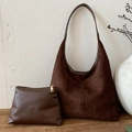 Deep brown matte suede hobo bag with matching small leather pouch on wooden surface - Brown
