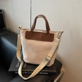 Fashionable beige tote bag with brown leather trim and wide adjustable strap - Khaki