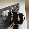 Chic black litchi pattern bucket bag with geometric silk scarf and shoulder strap - Black