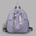 Vista frontale dettagliata dello zaino in nylon viola chiaro in tessuto impermeabile - Viola