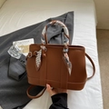 Brown lychee leather tote bag with a patterned silk scarf handle and long shoulder strap - Brown