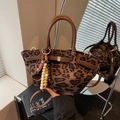 Vintage leopard print bucket handbag with brown leather straps and beaded tassel charm - Coffee with Pendant