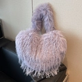 Fuzzy faux fur tote bag in lavender purple with a soft plush texture and trendy design - Purple