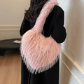Pink heart-shaped faux fur tote bag with a soft plush texture and shoulder strap - Pink