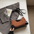 Brown suede and black leather half-moon shoulder bag on a minimalist white background - No Pendant / Brown