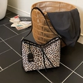 Vintage leopard print shoulder bag with black leather straps and fashion tag detail - Khaki