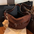 Deep brown oversized leopard-accented suede tote bag with metal buckles and plush charm - With Charm / Brown