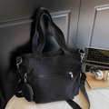 Schwarze Canvas-Tragetasche mit Mini-Geldbörse und verstellbarem Riemen für Schulter oder Crossbody - Schwarz