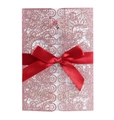 Detail view of pink glitter laser-cut lace wedding invitation with a red satin bow ribbon - Glitter Pink