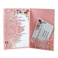 Detail of pink laser cut wedding invitation set with floral card and pearl paper - Pink